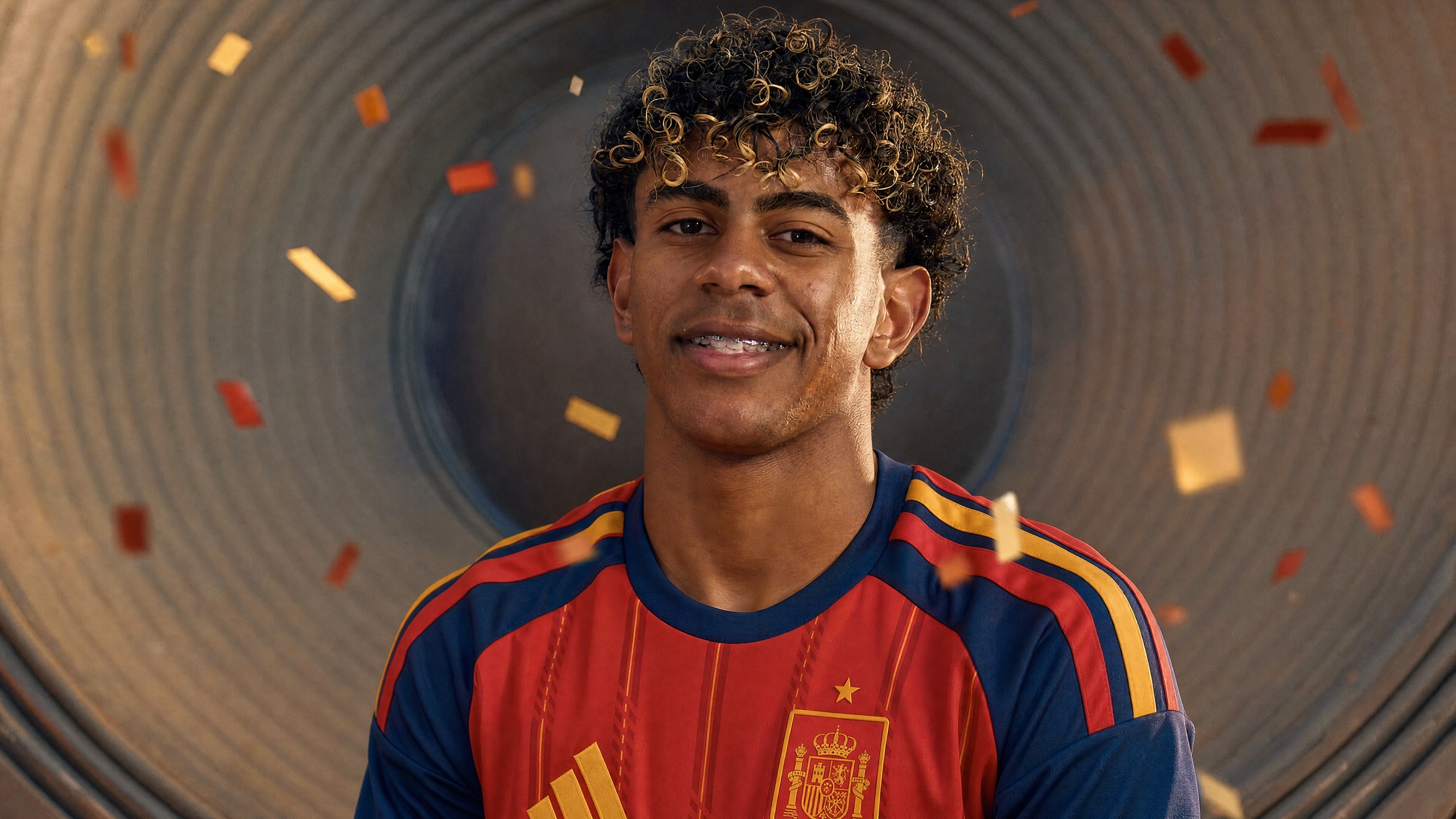 Lamine Yamal in the Spain shirt standing inside the spiral groove of a vinyl record, confetti falling around him