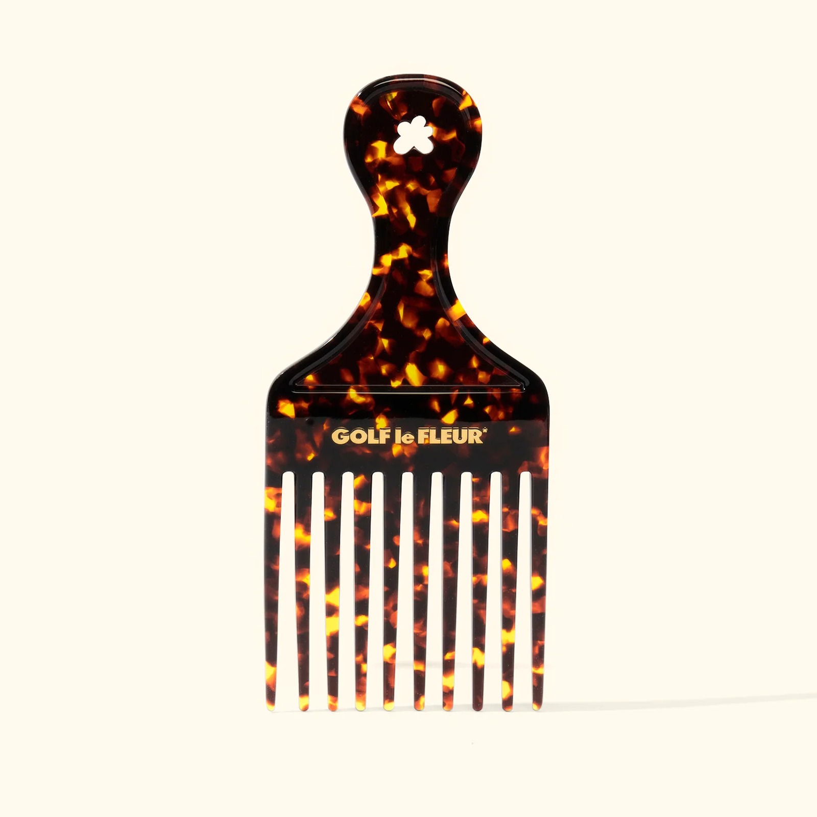 The tortoiseshell Golf le Fleur afro pick photographed on white