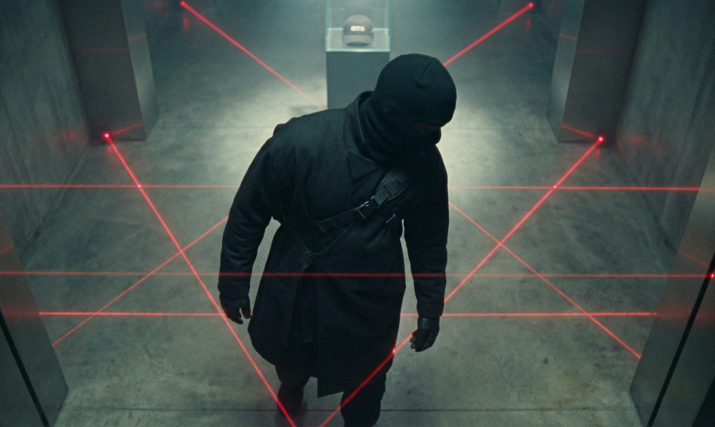 The thief crossing a web of red laser beams
